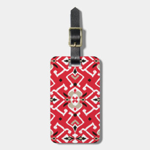 Levendig ikat patroon in rood, wit en zwart bagagelabel