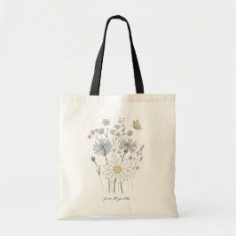Levendig veld met wilde bloemen tote bag