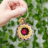 Levendige bloemenslingers sleutelhanger (Hand)