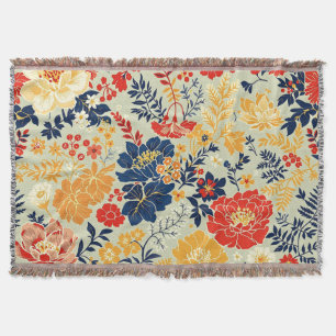 Levendige flora rood, geel en blauw op wit deken