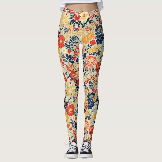 Levendige flora rood, geel en blauw op wit leggings (Voorkant)
