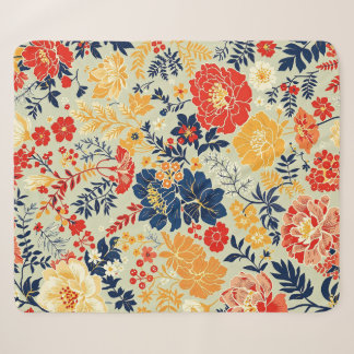 Levendige flora rood, geel en blauw op wit sherpa deken