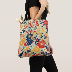 Levendige flora rood, geel en blauw op wit tote bag