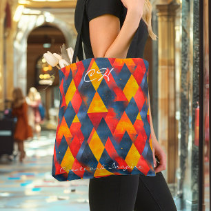 Levendige geometrische driehoeken in rood, geel, b tote bag