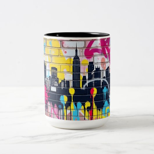 Levendige, met spuiten beschilderde skyline van de tweekleurige koffiemok (Center)
