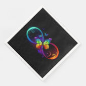 Levendige oneindigheid met regenboogvlinder op zwa servet (Hoek)