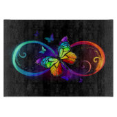 Levendige oneindigheid met regenboogvlinder op zwa snijplank (Voorkant)