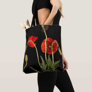 Levendige rode papavers op zwart tote bag