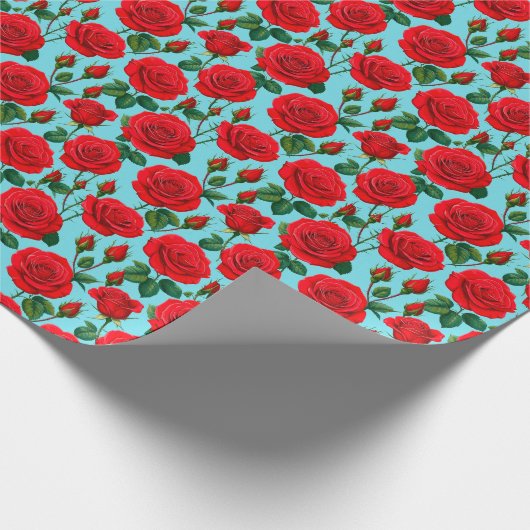 Levendige rode rozen op een lichtblauwe achtergron cadeaupapier (Hoek)