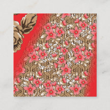 Levendige rode stof met ingewikkelde bloemen en