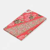 Levendige rode stof met ingewikkelde bloemen en post-it® notes (Schuin)