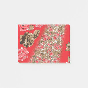 Levendige rode stof met ingewikkelde bloemen en post-it® notes