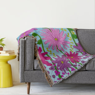 Levendige roze bloem tekening op blauw deken