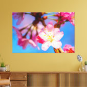 Levendige roze kersenbloesems en heldere blauwe lu canvas afdruk (Insitu (Woonkamer))