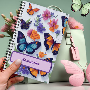 Levendige vlinders en bloemen notitieboek