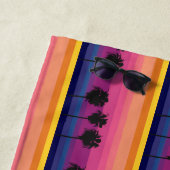 Levendige zonsondergang met silhouetten van palmbo strandlaken (In situ)