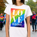 Lgbt Gay Pride Love T-shirt<br><div class="desc">Dit Gay Pride T-shirt is versierd met LOVE IS LOVE in vetgedrukte witte letters op een waterverf regenboogachtergrond van rood, oranje, geel, groen, blauw en paars. Oorspronkelijke Waterverf © Michele Davies.</div>