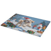 Lhasa Apso loopt in de sneeuw met kerstmuts Snijplank (Hoek)