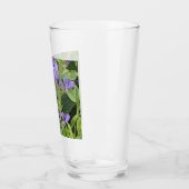 Libel met blauwe ogen op paarse bloemen glas (Links)