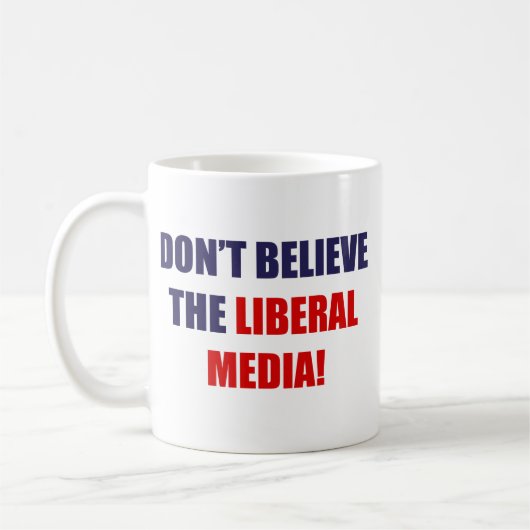 Liberale media koffiemok (Links)