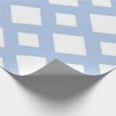 Licht blauw vak op wit cadeaupapier (Hoek)