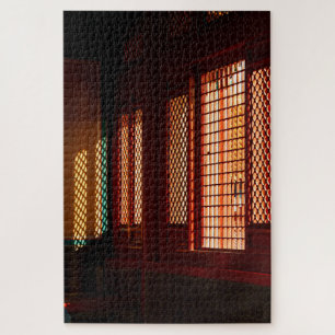 Licht door openingen in gaasvensters legpuzzel