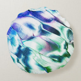 Licht gekleurd van metaal, groen tot blauw rond kussen