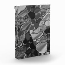 Licht grijze en donkere afgeronde vormen.