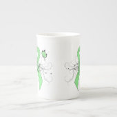 Licht groen lintje met vlinder porselein kop (Voorkant)