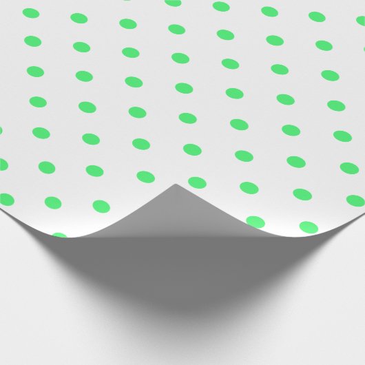 Licht groene poolpunt op witte grote ruimte cadeaupapier (Hoek)