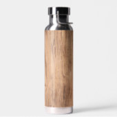 Licht houten bord met gladde houten korrels waterfles (Links)