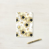 Licht naadloos met gouden sterren post-it® notes (Op bureau)