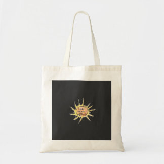 Licht schijnt door de duisternis tote bag