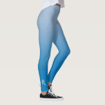 Licht tot donkerblauw gradiënt met elegant monogra leggings<br><div class="desc">Stijlvol licht tot donkerblauw verloop heeft een elegant aangepast monogram in een wit decoratief lettertype aan de onderkant van het rechterbeen. Personaliseer het met uw initiaal in de zijbalk. Voeg een moderne look toe aan je garderobe. Om het minimale ombré-ontwerp op andere items te zien, klikt u op de link...</div>
