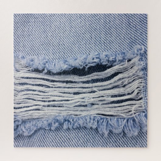 Lichtblauwe gescheurde jeans textuur legpuzzel (Verticaal)