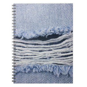 Lichtblauwe gescheurde jeans textuur notitieboek