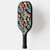 Lichte vierkantjes op donker pickleball paddle (Links)