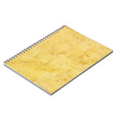 lichtgele abstracte getextureerde pleister op de w notitieboek (Linkerzijde)