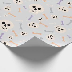 Lichtgrijs inpakpapier met schedels en Botten