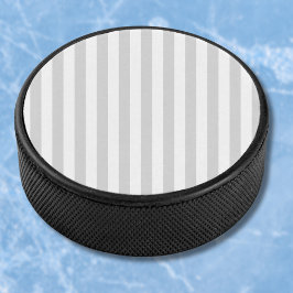 Lichtgrijze en witte strepen hockey puck