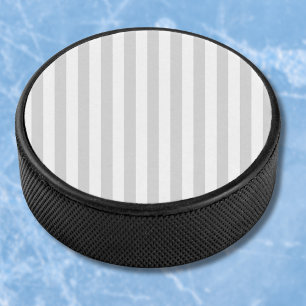 Lichtgrijze en witte strepen hockey puck