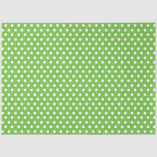 Lichtgroene achtergrond met witte pooldots tissuepapier