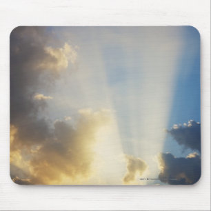 Lichtstraal door de wolken muismat