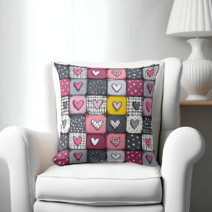 Lief patchworkpatroon met harten kussen