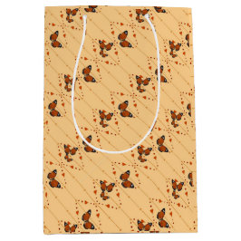 Liefde en botervliegen in oranje diagonaal medium cadeauzakje