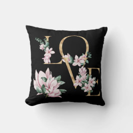 Liefde in gouden letters met magnoliumbloemen kussen