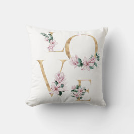 Liefde in gouden letters met magnoliumbloemen kussen