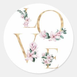 Liefde in gouden letters met magnoliumbloemen ronde sticker