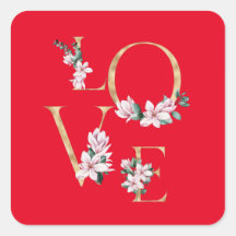 Liefde in gouden letters met magnoliumbloemen