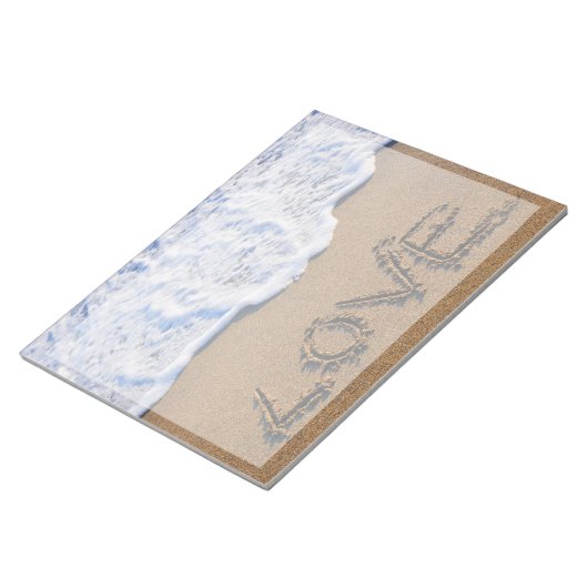 Liefde in het zand geschreven notitieblok (Schuin)